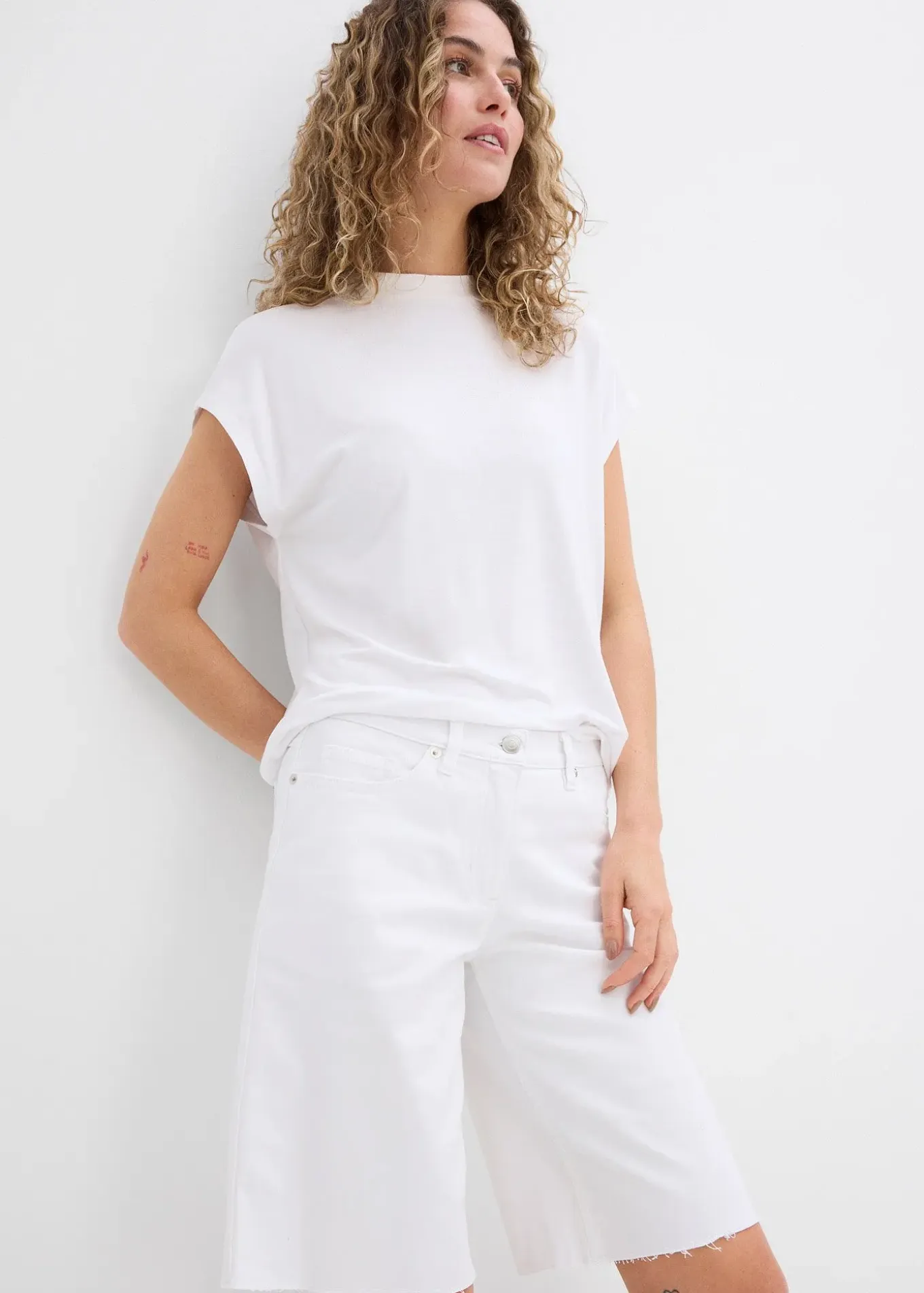 Bermuda à finition effilochée