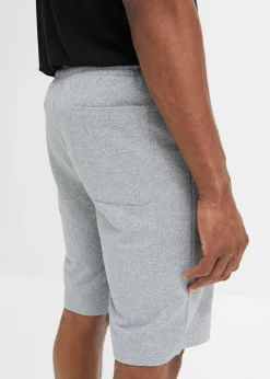 Bermuda sweat avec poches latérales zippées