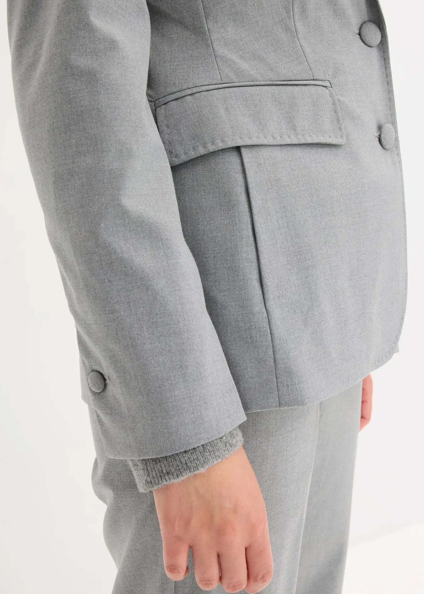 Blazer avec détails surfilés décoratifs