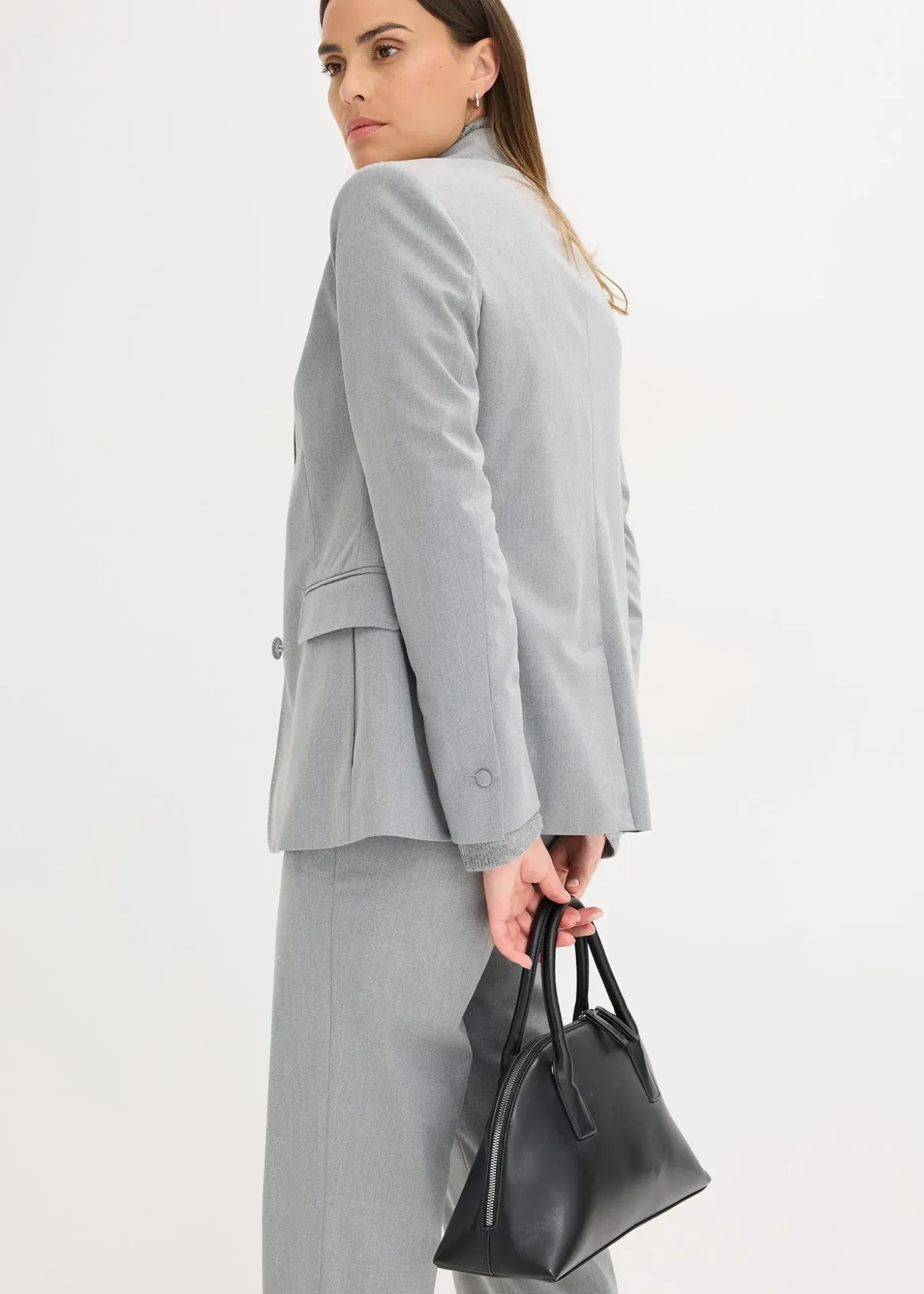 Blazer avec détails surfilés décoratifs