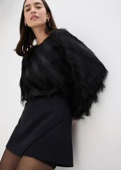 Blouse à détails frangés