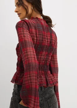 Blouse à empiècement smocké