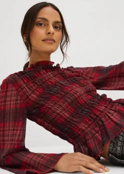 Blouse à empiècement smocké