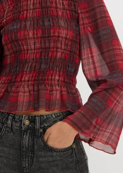 Blouse à empiècement smocké