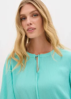 Blouse à manches papillon