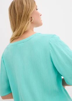 Blouse à manches papillon