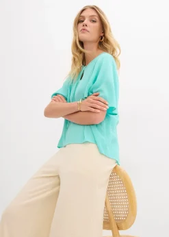 Blouse à manches papillon