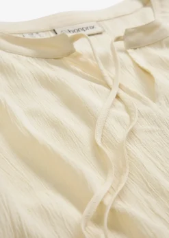 Blouse à manches papillon