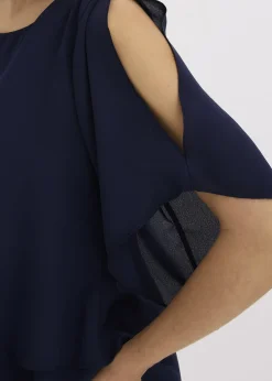 Blouse à pans, look superposé