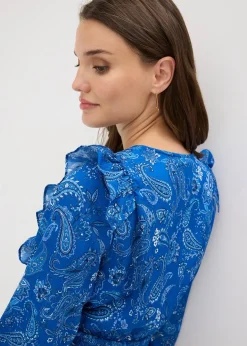 Blouse à volants et smocks