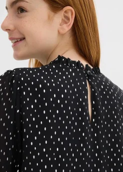 Blouse en mousseline à col volanté