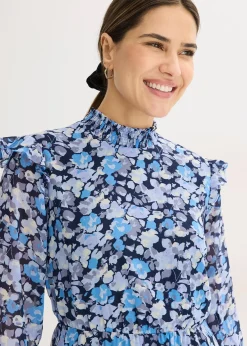 Blouse en mousseline à col montant