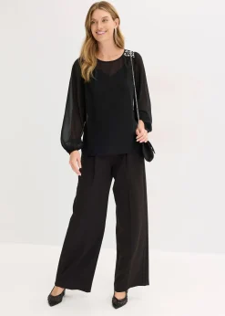 Blouse en mousseline avec strass sur les épaules