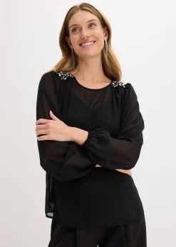 Blouse en mousseline avec strass sur les épaules