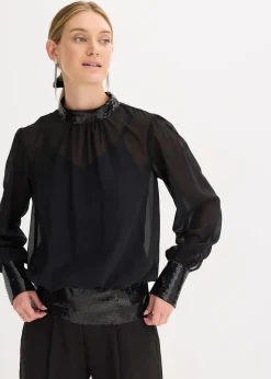 Blouse en tulle fin avec empiècements à sequins