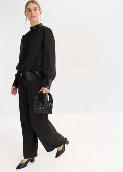 Blouse en tulle fin avec empiècements à sequins