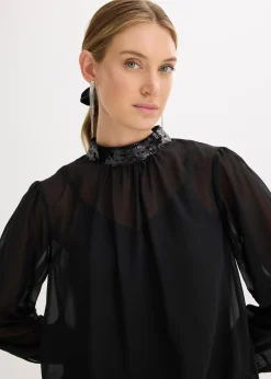 Blouse en tulle fin avec empiècements à sequins