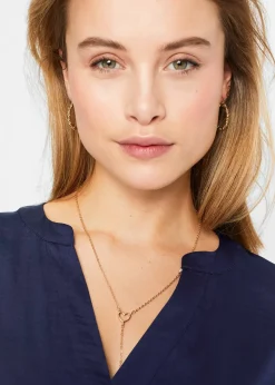 Blouse manches courtes ample en satin avec épaules descendues