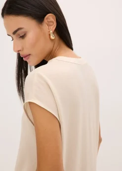 Blouse manches courtes ample en satin avec épaules descendues