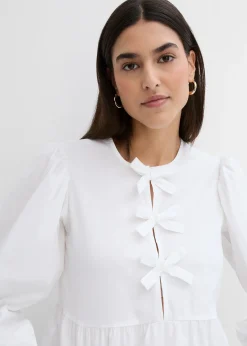 Blouse ornée de nœuds