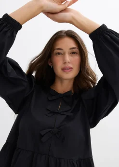 Blouse ornée de nœuds