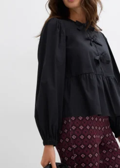 Blouse ornée de nœuds