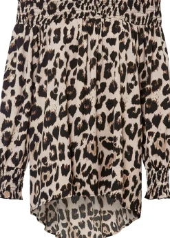 Blouse plus longue derrière