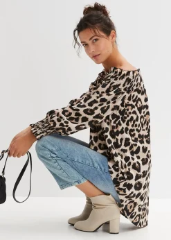 Blouse plus longue derrière