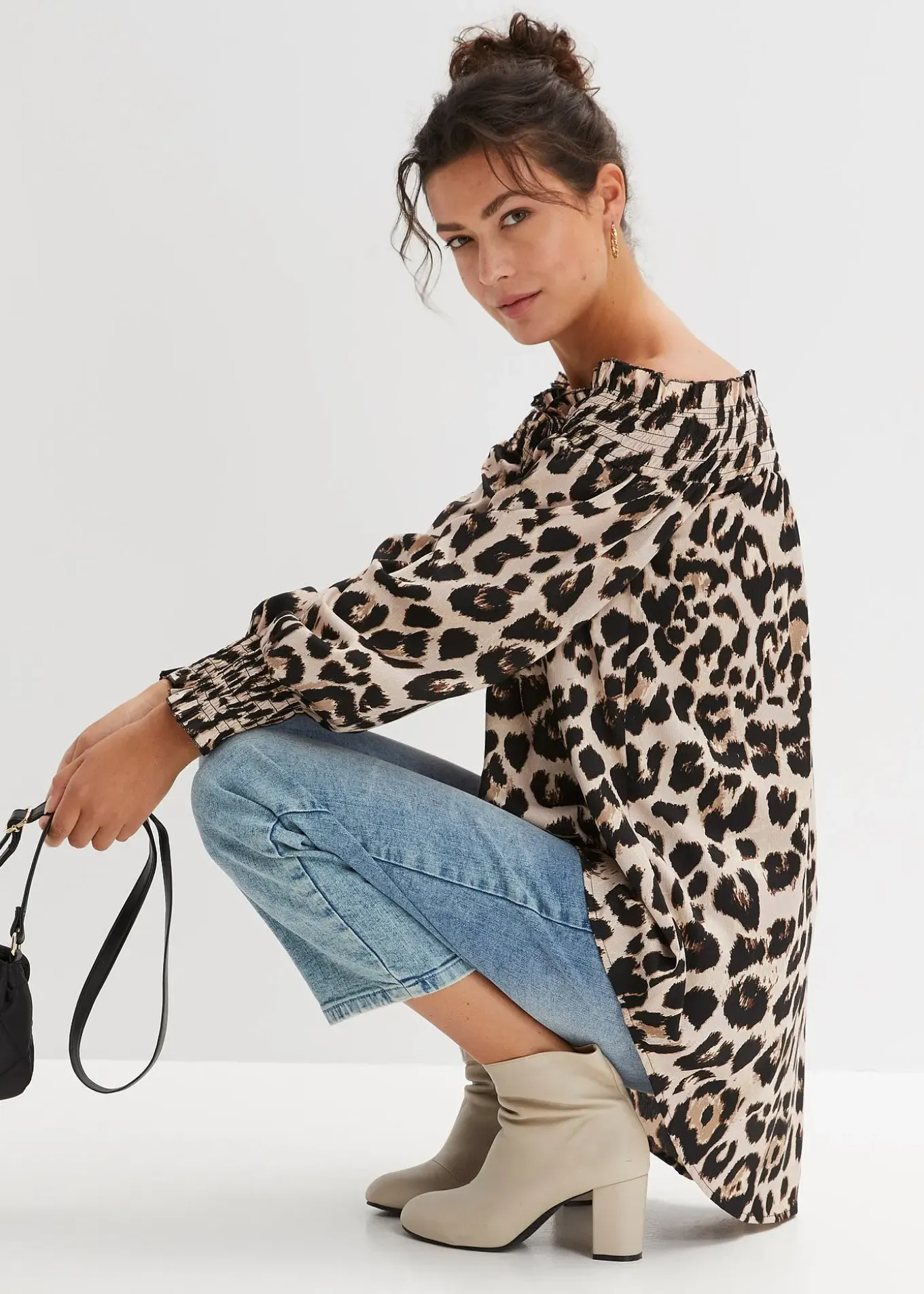 Blouse plus longue derrière