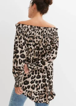 Blouse plus longue derrière