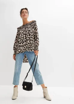 Blouse plus longue derrière