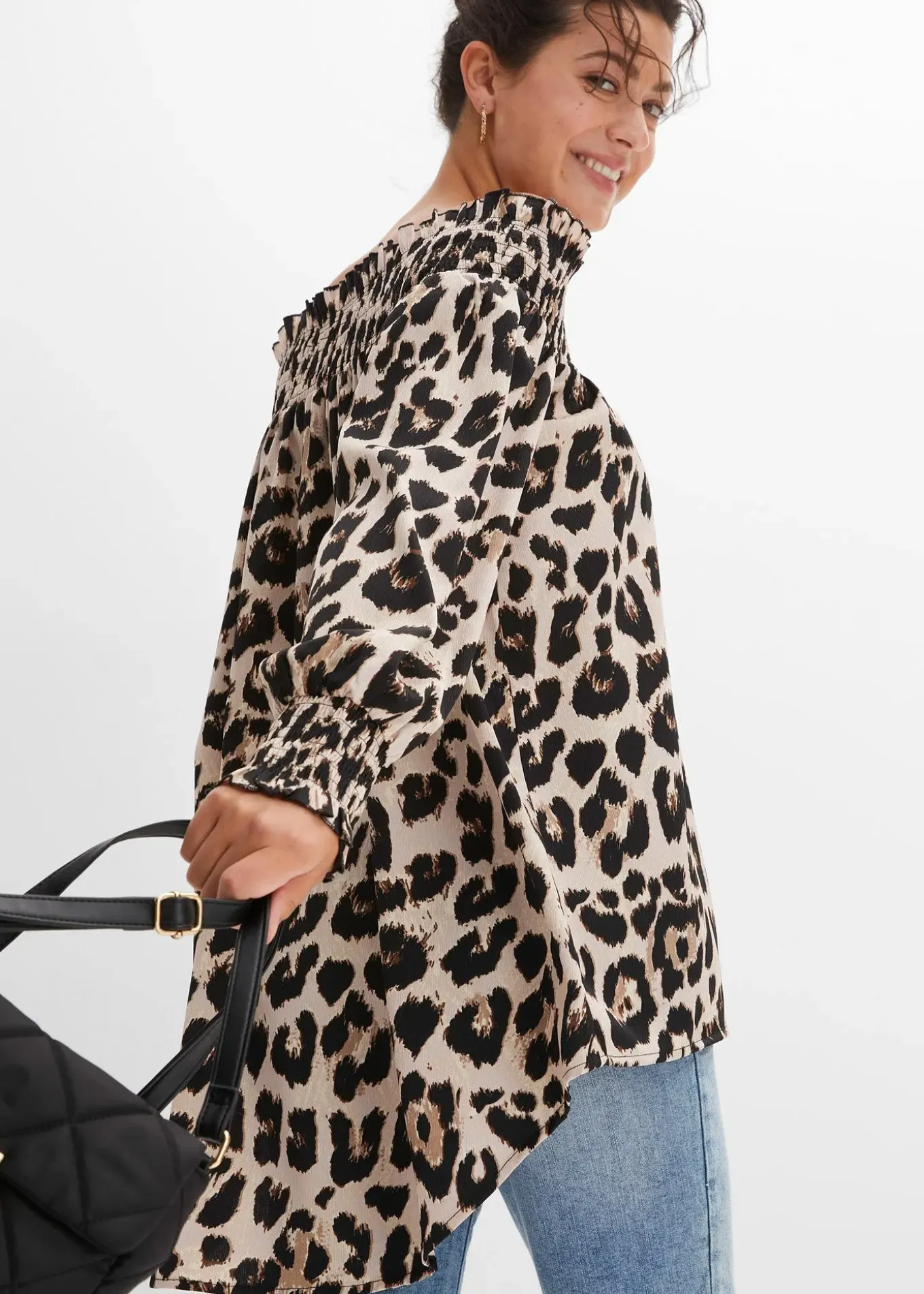 Blouse plus longue derrière