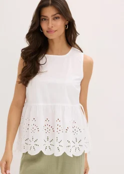 Blouse sans manches avec broderies anglaises, fendue sur les côtés