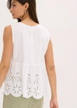 Blouse sans manches avec broderies anglaises, fendue sur les côtés