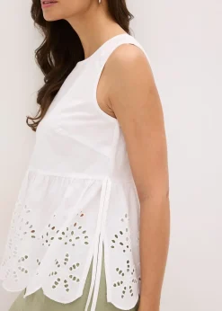 Blouse sans manches avec broderies anglaises, fendue sur les côtés