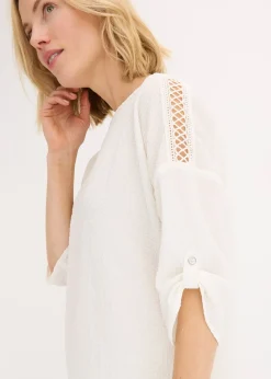 Blouse texturée avec bande de dentelle