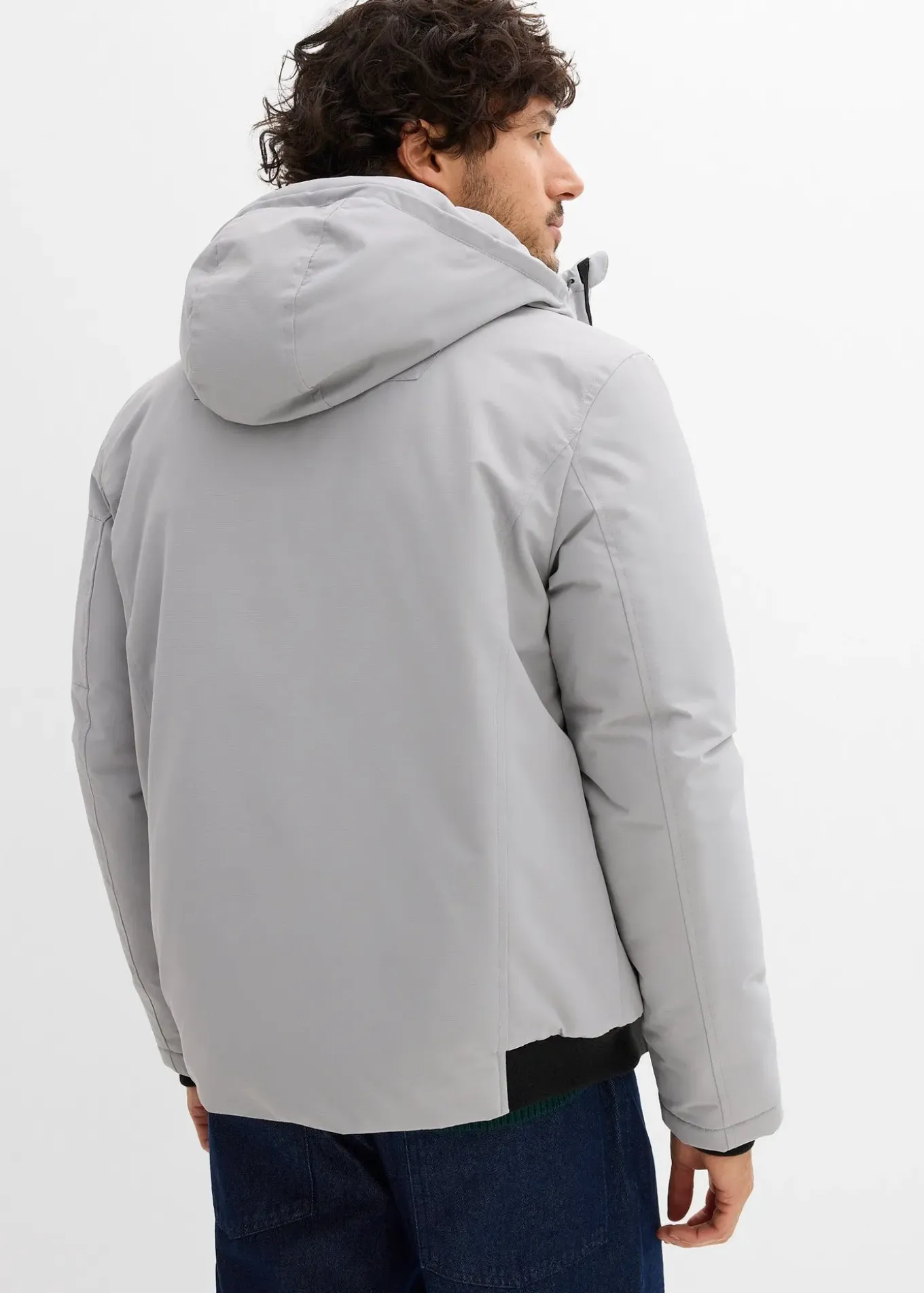 Blouson d’hiver à capuche et détails sportifs