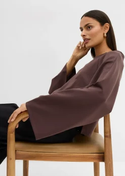 Cape à manches longues