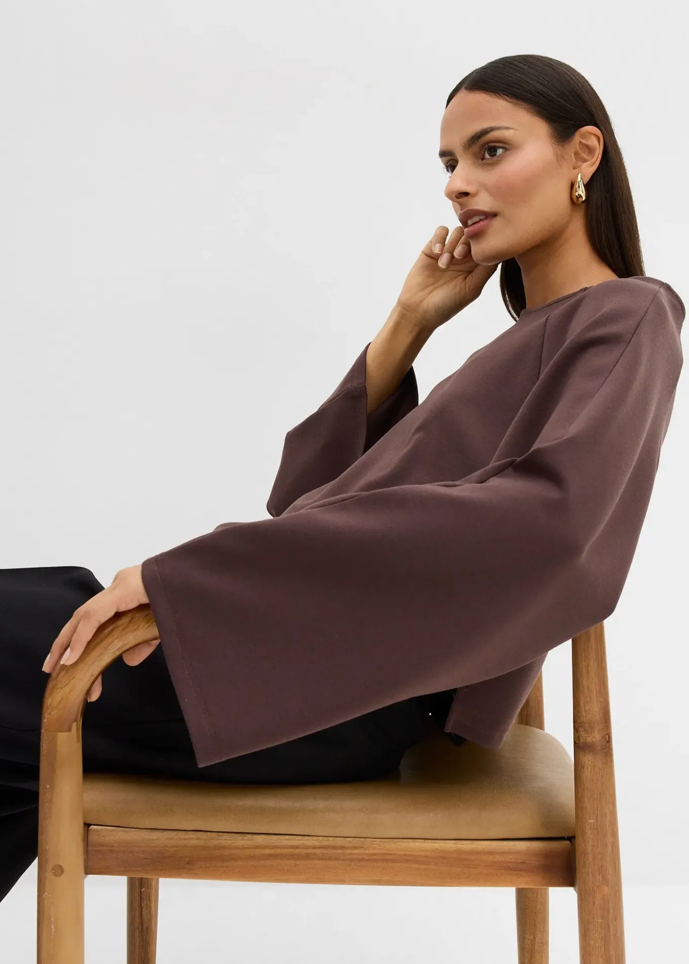 Cape à manches longues