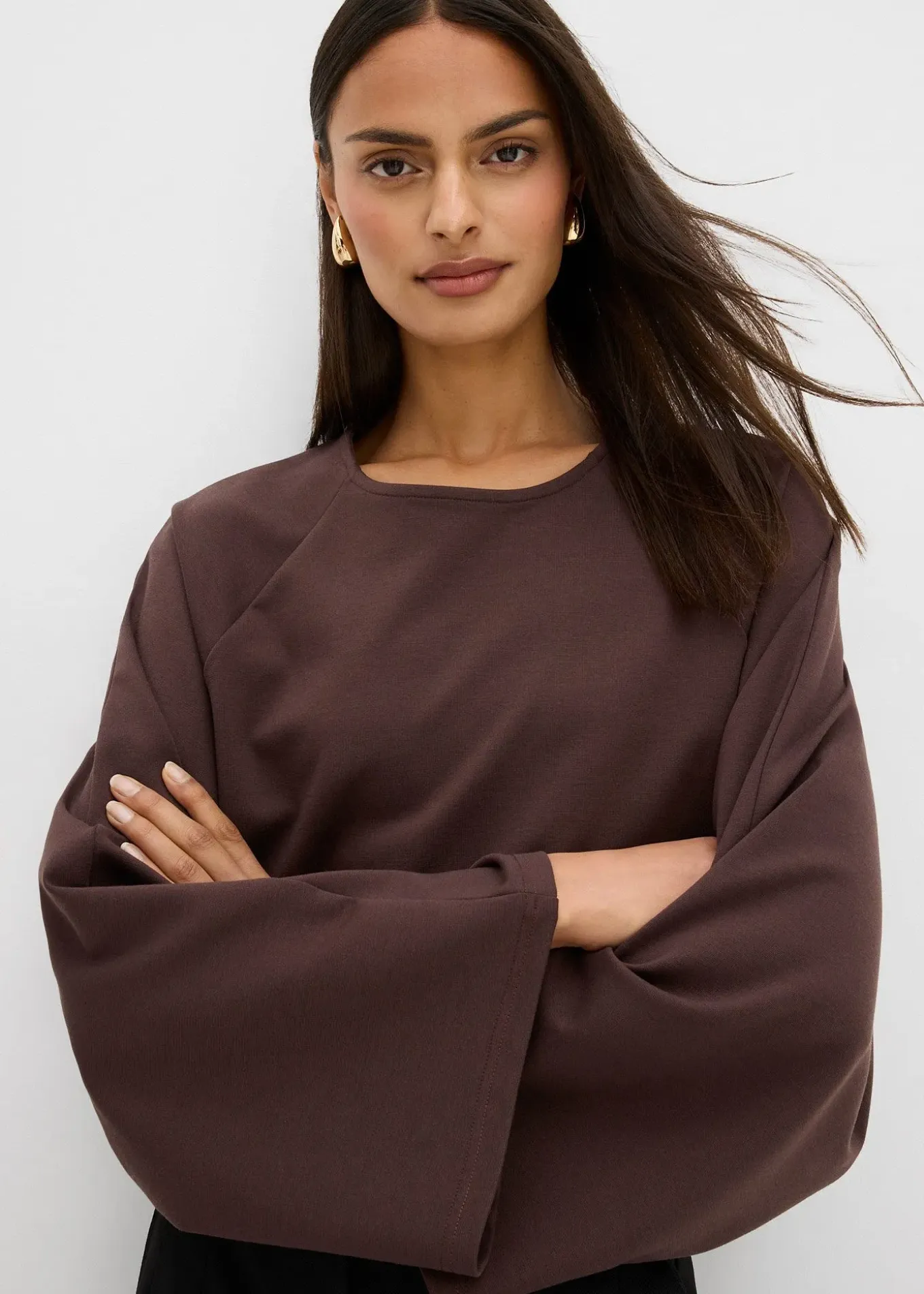 Cape à manches longues