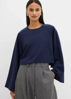 Cape à manches longues