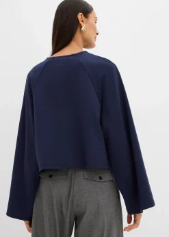 Cape à manches longues