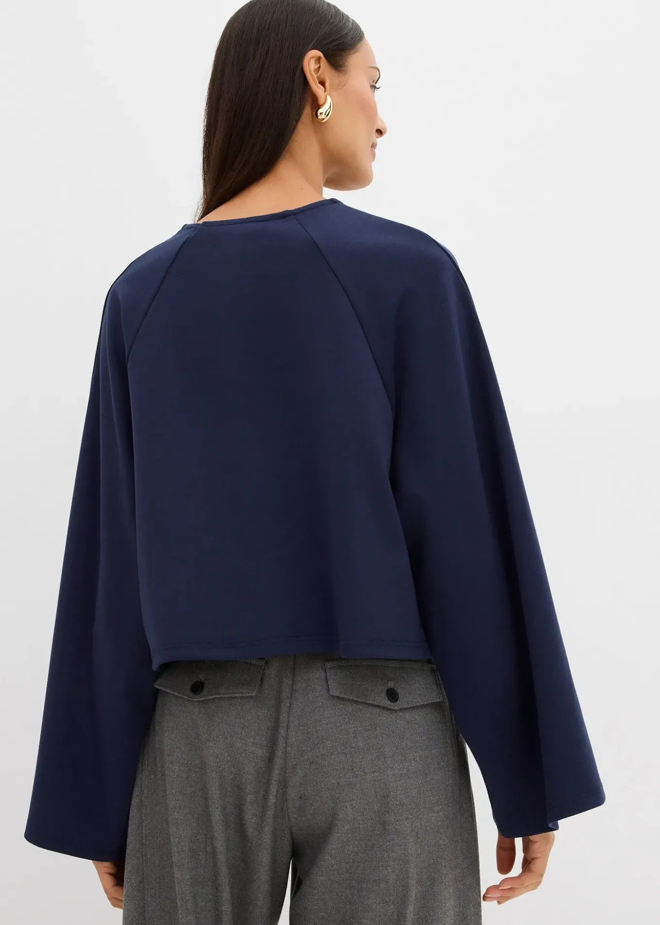 Cape à manches longues