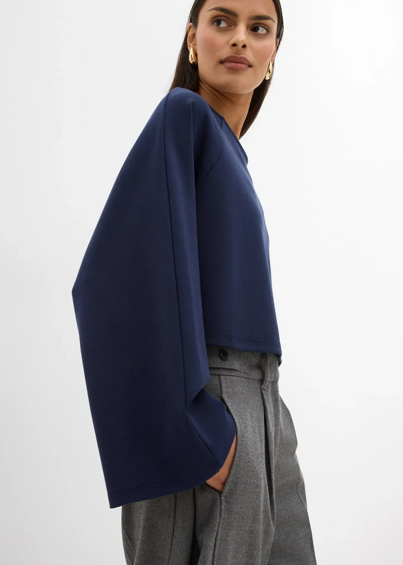 Cape à manches longues