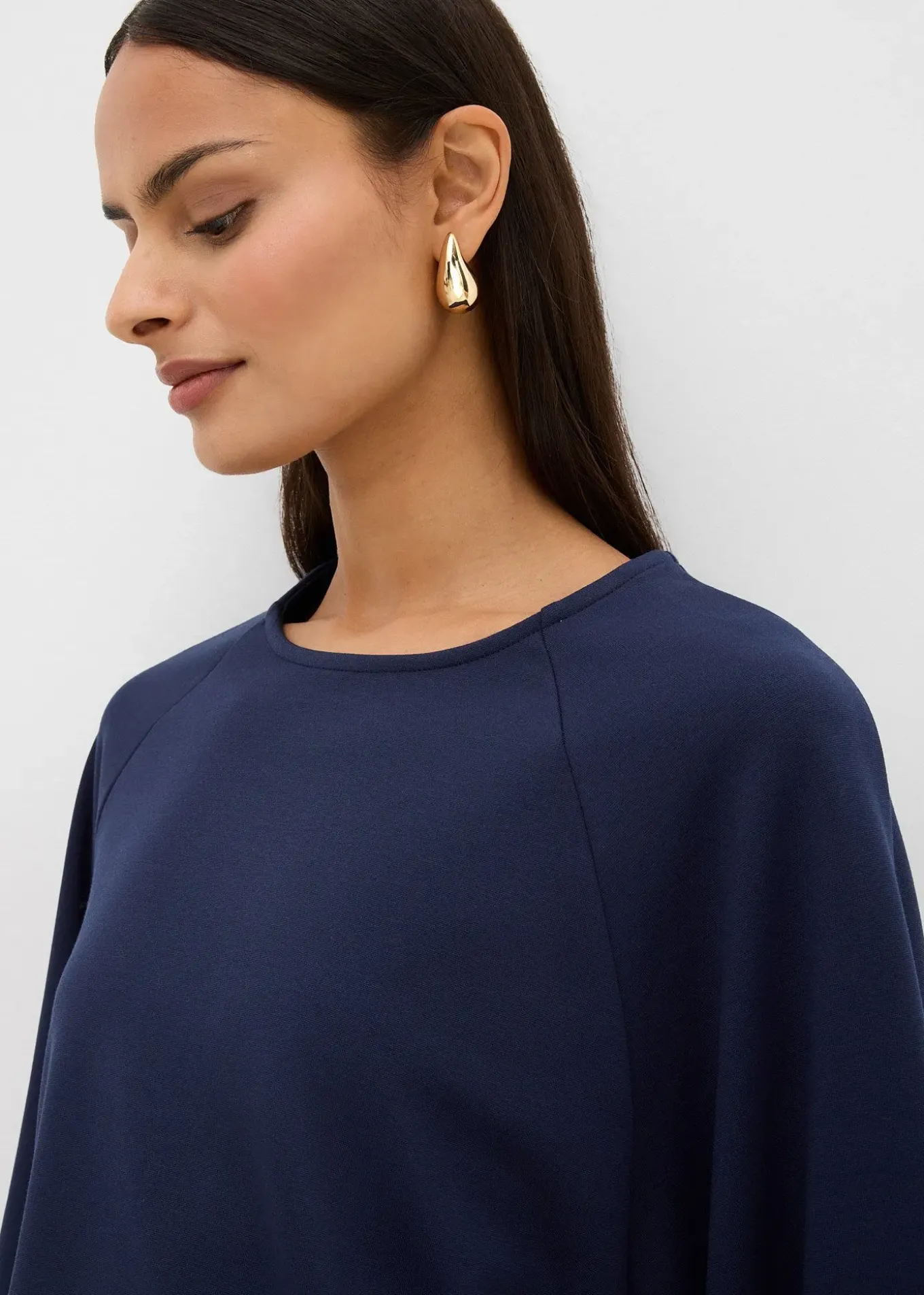 Cape à manches longues