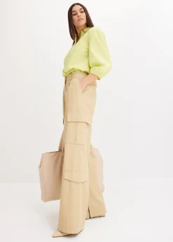 Chemisier court devant, long derrière, manches ballon