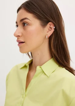 Chemisier court devant, long derrière, manches ballon