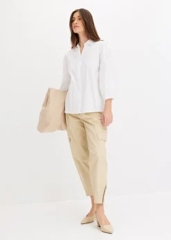 Chemisier court devant, long derrière, manches ballon