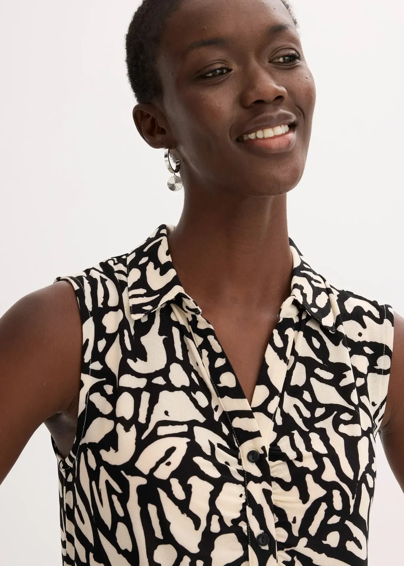 Chemisier froncé sans manches, col polo