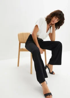 Combinaison avec boucle décorative